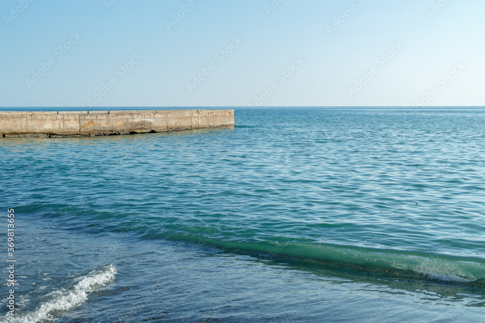 Breakwater with going out to sea Breakwater with going out to sea