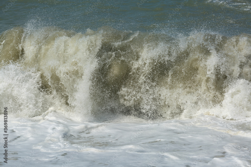 Sea wave in a storm close up