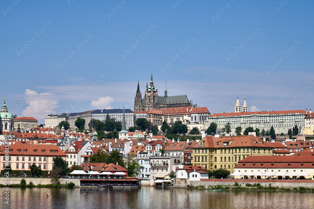 View of Prague castle with St. Vitus Cathedral and Vltava river