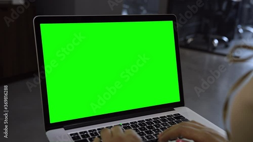 Wallpaper Mural Laptop template with white transparent screen, computer blank display isolated. Metal device. Fingers press keys of the keyboard. Green Torontodigital.ca