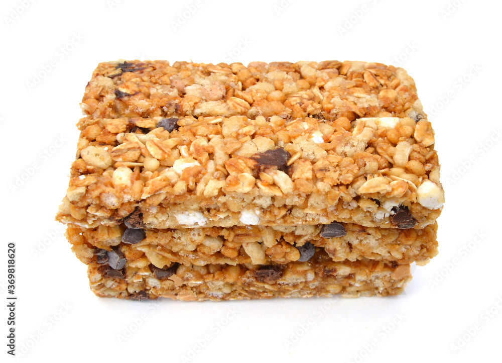 Stack chocolate chip with peanuts protein bars isolated on a white background. Stack chocolate chip with peanuts protein bars isolated on a white background.