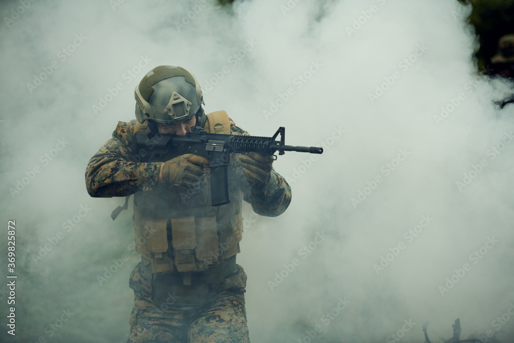 soldier in action aiming on weapon laser sight optics soldier in action aiming on weapon laser sight optics