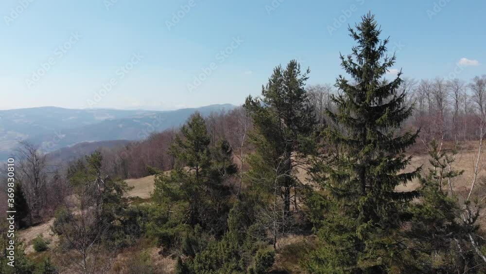Takeoff over Hala Jaworzyna in Beskid Sadecki in early spring Takeoff over Hala Jaworzyna in Beskid Sadecki in early spring