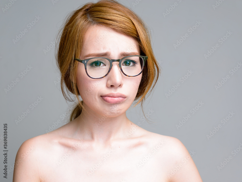 Portrait of young beautiful Asian woman shirtless Portrait of young beautiful Asian woman shirtless