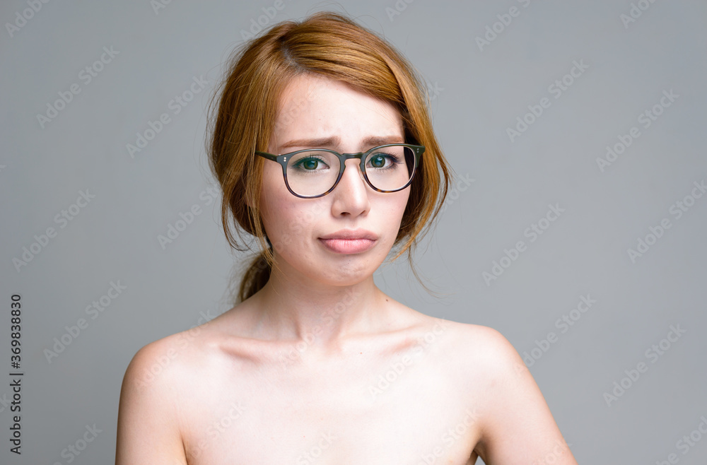 Portrait of young beautiful Asian woman shirtless Portrait of young beautiful Asian woman shirtless