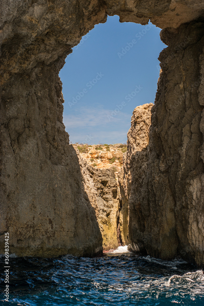 view through rock in Malta