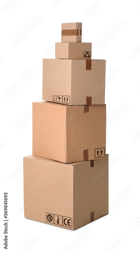 Stack of parcels with different packaging symbols on white background