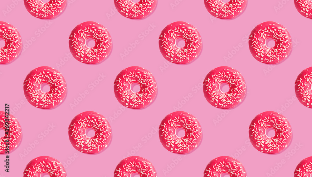 Creative pattern design of glazed donuts on pink background, banner Creative pattern design of glazed donuts on pink background, banner