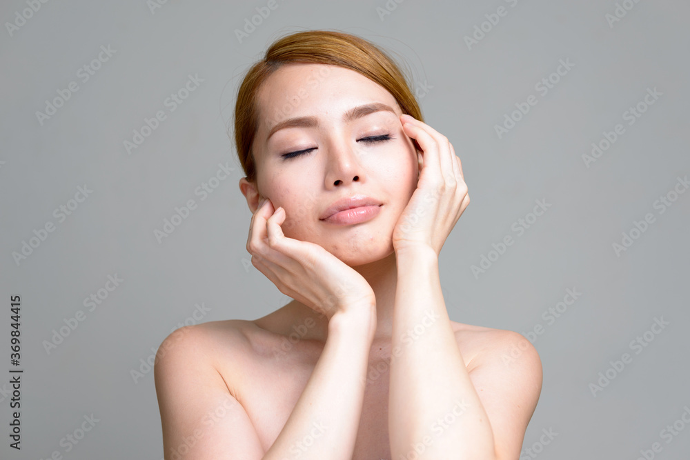 Portrait of young beautiful Asian woman shirtless Portrait of young beautiful Asian woman shirtless