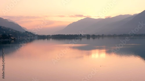 Wallpaper Mural Drone view of Lake Iseo at sunrise, on the left the city of lovere which runs along the lake,Bergamo Italy. Torontodigital.ca