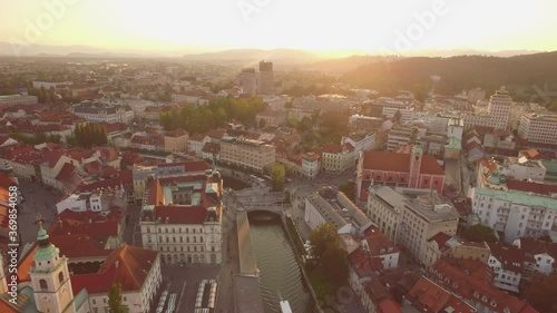 Into the sunlight above Ljubljana aerial video photo