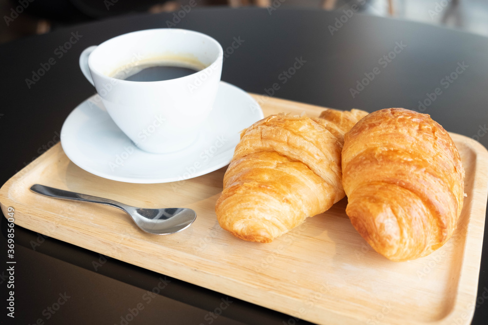 Black Coffee Snack Set in White Coffee Mug with 2 Croissant Bread Black Coffee Snack Set in White Coffee Mug with 2 Croissant Bread