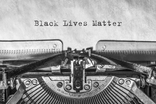Black lives matter modern logo, banner, design concept, sign, with black and white text on a flat black background.