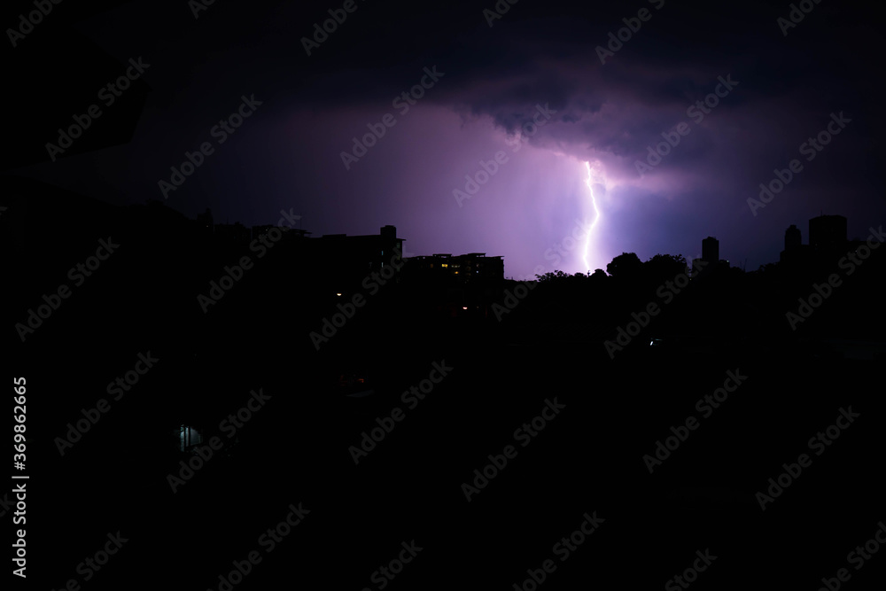 a thunderstorm is coming with a series of lightning flashes in Manila