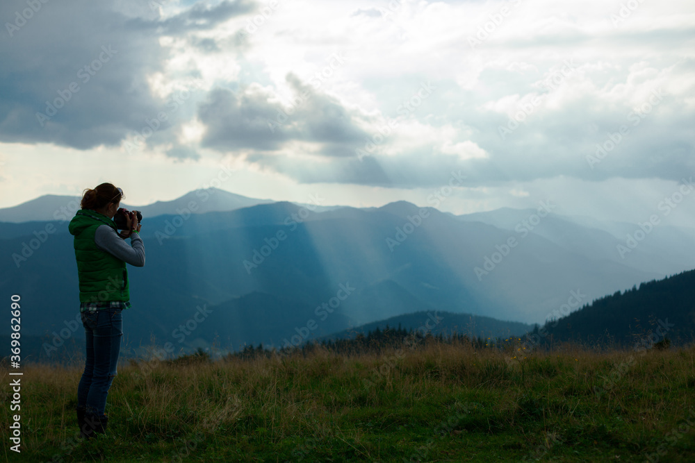 photographer in Ukraine Carpathians shoots a landscape