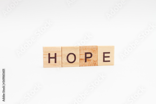 HOPE words on wooden blocks. Optimism concept