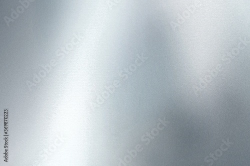 Glowing silver foil glitter paper wall with copy space, abstract texture background