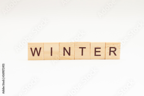 Winter words on wooden blocks. Concept Seasons of year