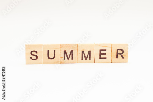 SUMMER words on wooden blocks. Concept Seasons of year