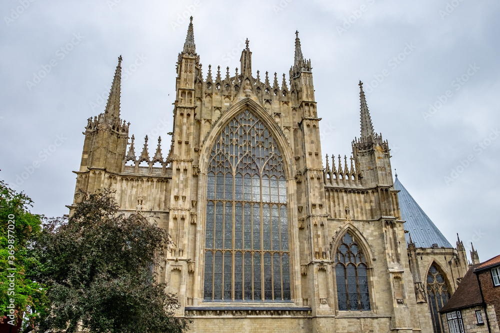 The exterior of York Minster, in York, England, on a cloudy day.