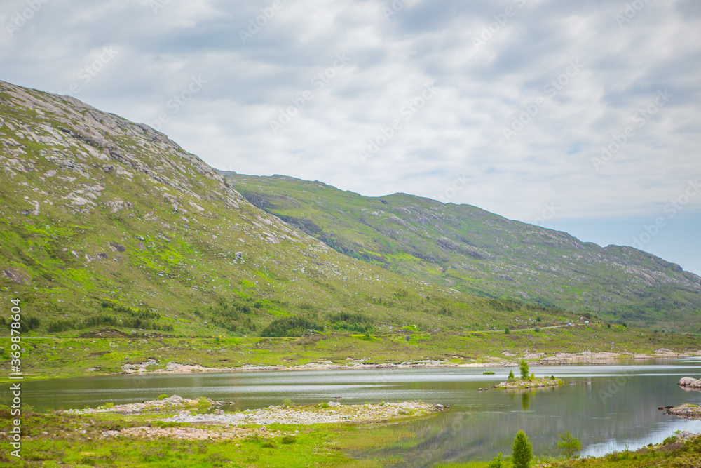 The mountains and lakes landscape in Isle of Skye, north part in Scotland.