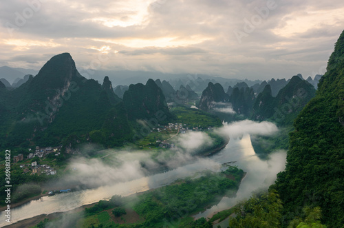 Stunning Asian natural landscapes  mountain peaks in clouds and natural scenery of the Yangtze River in China.