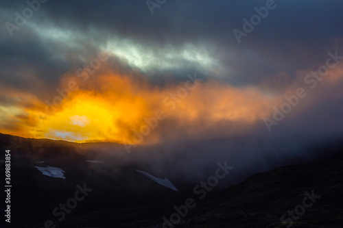 Sunset in mountain and misty terrain of Iceland. Nature and places for wonderful travels