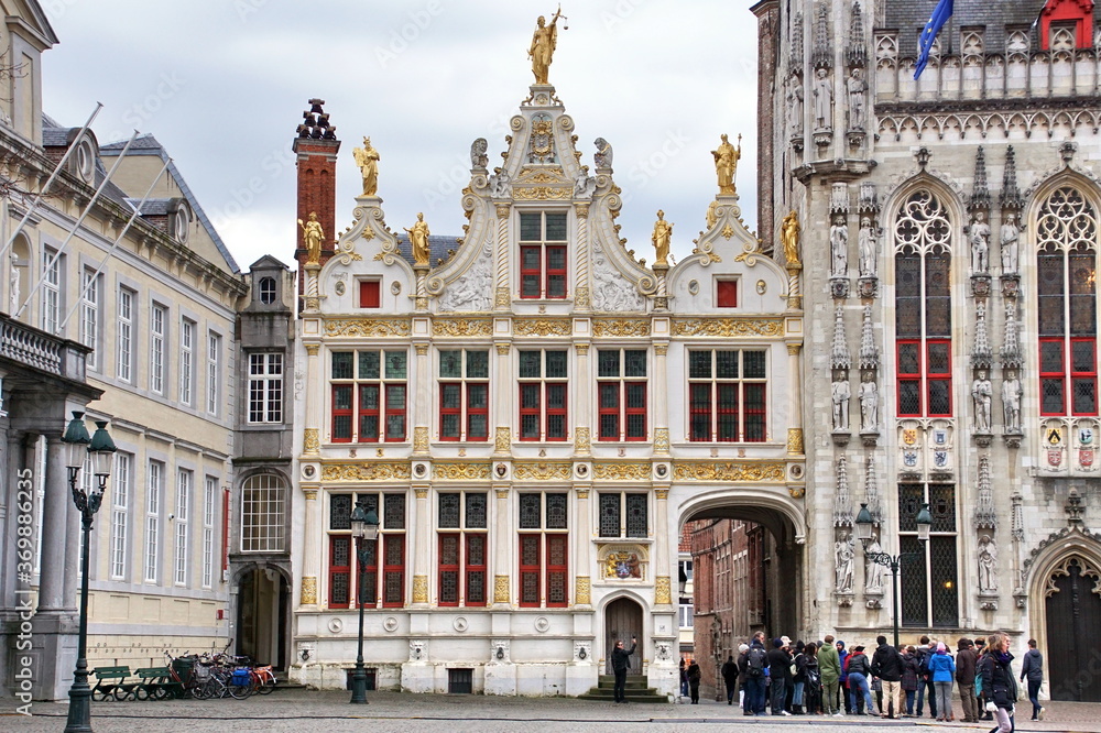 Historic buildings of the Brugse Vrije with the old Civil Registrar building on the right on the Burg Square in the heart of the medieval city of Bruges, Belgium