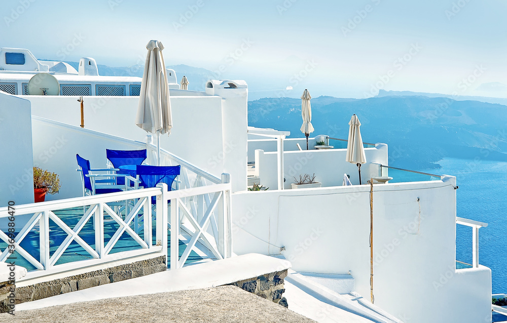 Obraz premium The view to caldera from hotel balcony in Firastephani, Santorini, Greece