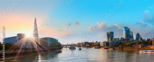 Skyline of London with Thames River at sunset - United Kingdom
