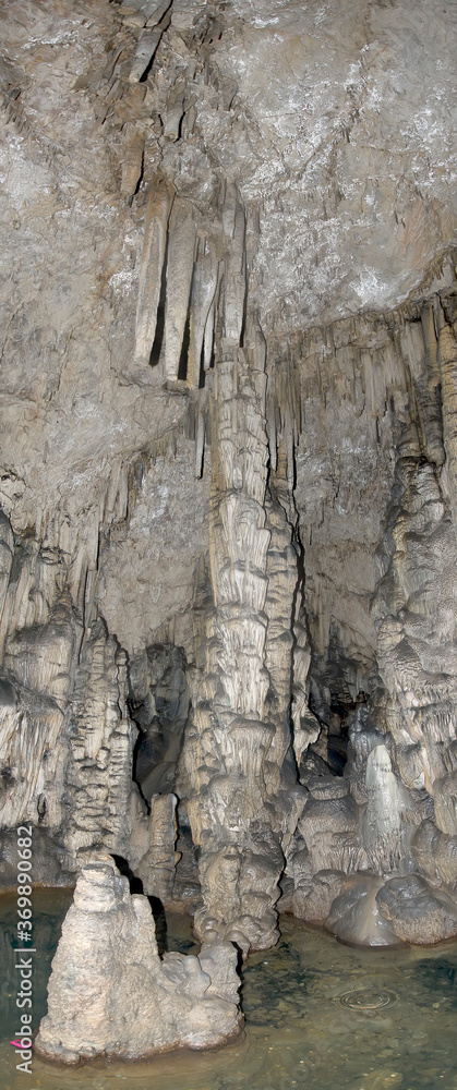 Stalagmite, the natural pillar, in the Psychro Cave, Crete, Greece Stalagmite, the natural pillar, in the Psychro Cave, Crete, Greece