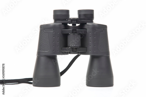 black binoculars on a white background. optical instrument