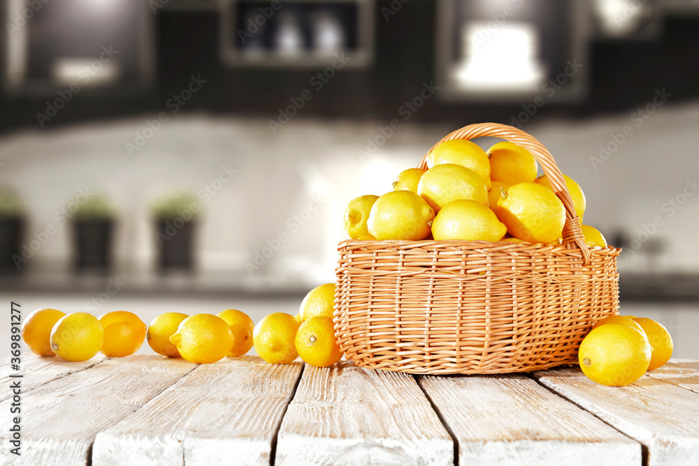 Fresh lemon fruits on wooden table and free space for your decoration 
