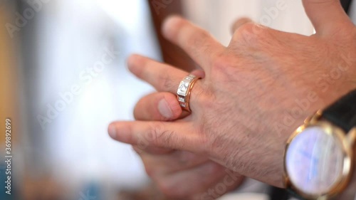 wedding rings in hand