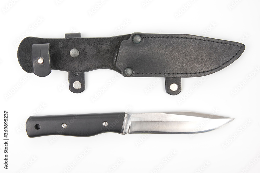 knife for camping and hunting in a leather case on a white background. cutting tool. isolated object knife for camping and hunting in a leather case on a white background. cutting tool. isolated object