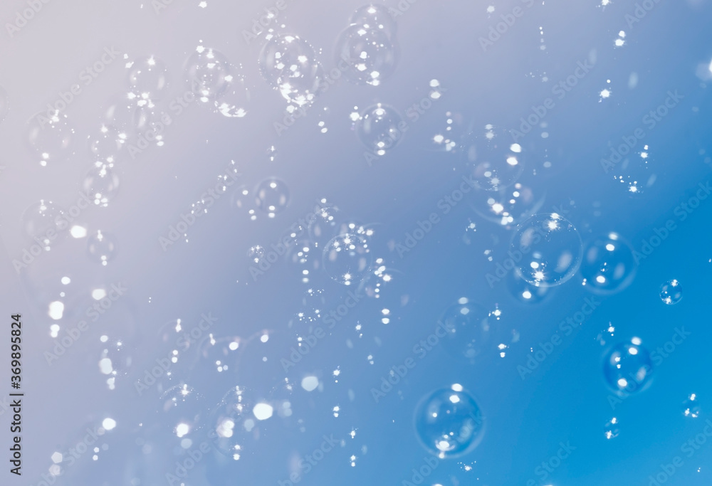 Beautiful blue gradient with soap bubbles float background.