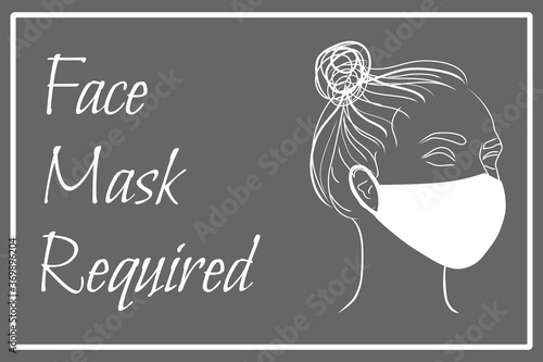 Signage Face Mask Required. Girl in protective medical face mask photo