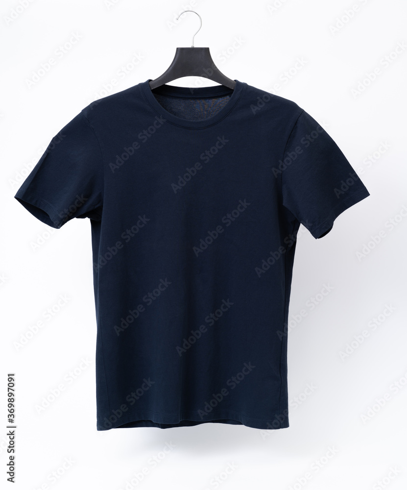 Blank navy T-shirt. clothes on isolated white background. Blank navy T-shirt. clothes on isolated white background.