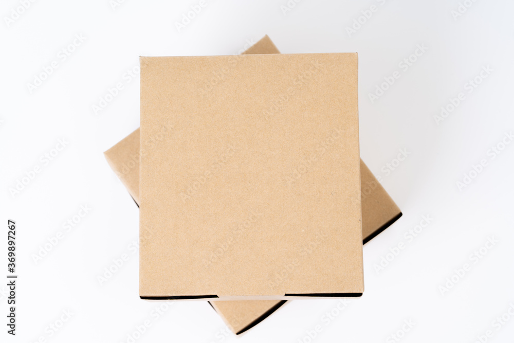 Brown paper box for food package. carton on a white background. Brown paper box for food package. carton on a white background.