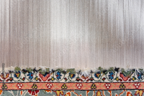 Wallpaper Mural Partly woven carpet, rug on a loom shows wool pile, foundation, warp and weft. Torontodigital.ca