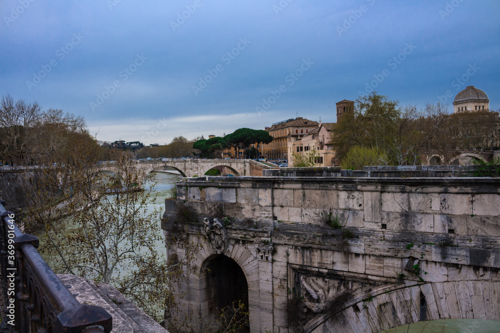 The Emiliо bridge or Ponte Rotto is the oldest stone bridge in Rome.In the background, the island of Tiberina and the river Tiber.