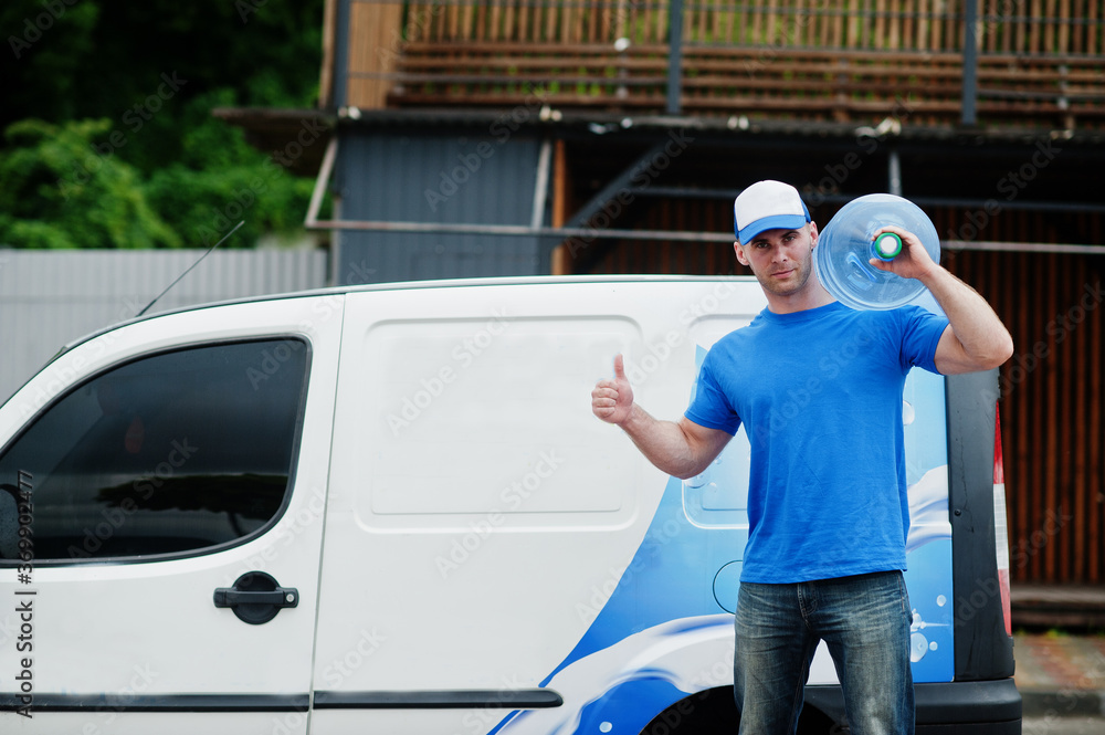 Delivery men in front cargo van delivering bottles of water and show thumb up.