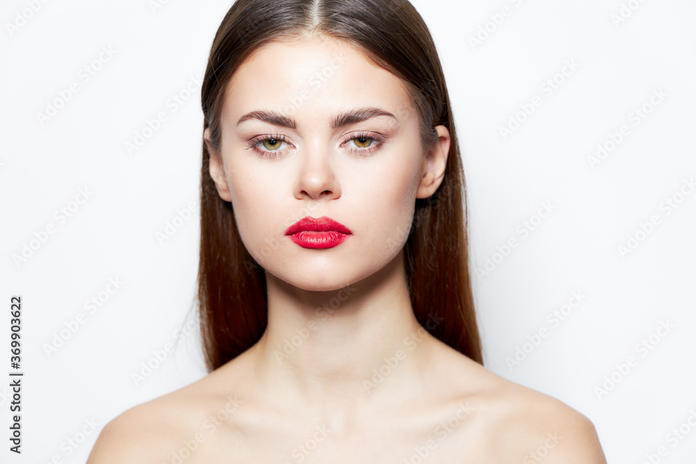 Attractive woman Bare shoulders looking forward red lips clear skin spa treatments Attractive woman Bare shoulders looking forward red lips clear skin spa treatments