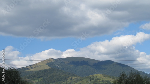Fototapeta Naklejka Na Ścianę i Meble -  clouds over the mountain