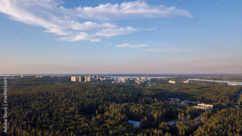 View of the city in the forest summer drone, sunny day. Ukraine, Vyshgorod