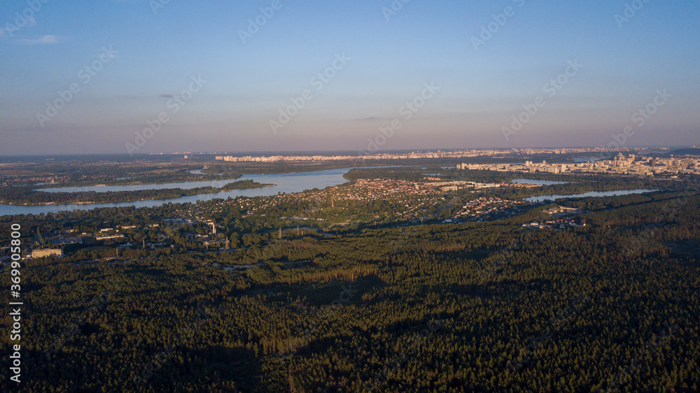 View of the city in the forest summer drone, sunny day. Ukraine, Vyshgorod