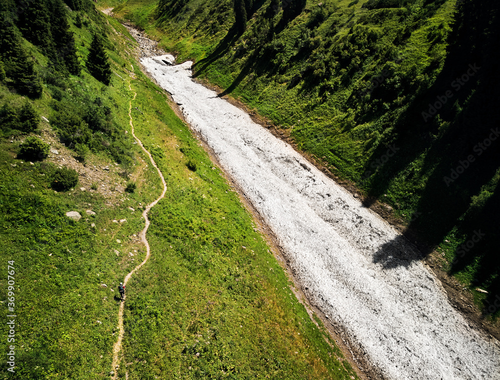 Aerial view snow mountain glacier in the summer mountains Aerial view snow mountain glacier in the summer mountains