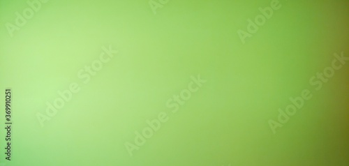 green gradation_white wall with blue and green and yellow light_for background