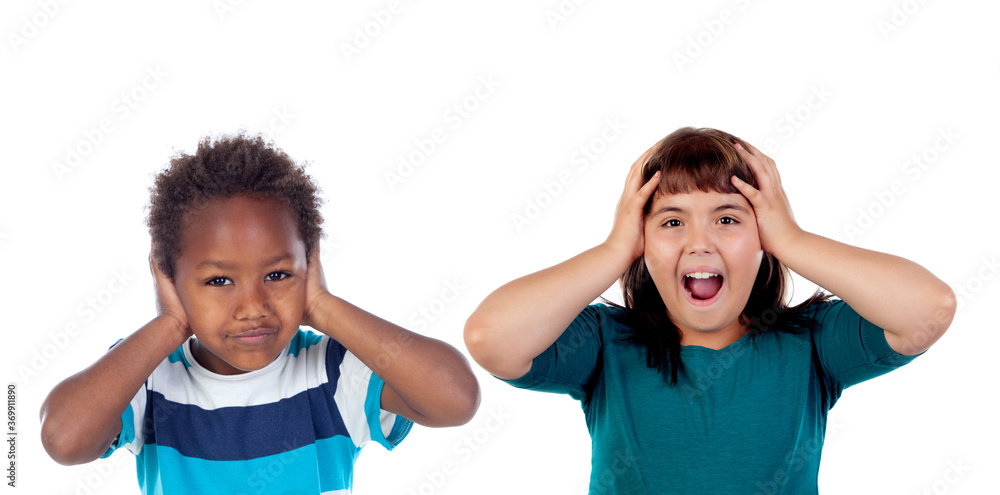 Children covering the ears and shocked by a loud sound Children covering the ears and shocked by a loud sound