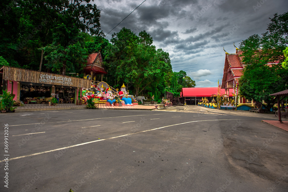 Wat Khiriwan-Nakhon Nayok: 1 August 2020, atmosphere within a religious tourist site, with tourists visiting for merit during the holidays in Si Nawa area, Mueang Nakhon Nayok, Thailand. Wat Khiriwan-Nakhon Nayok: 1 August 2020, atmosphere within a religious tourist site, with tourists visiting for merit during the holidays in Si Nawa area, Mueang Nakhon Nayok, Thailand.